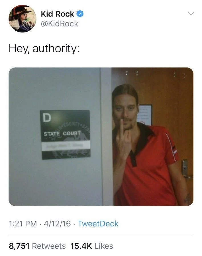 Kid Rock: hey, authority 

(the singer in question standing at the door to state Court rebelliously raising his middle finger)